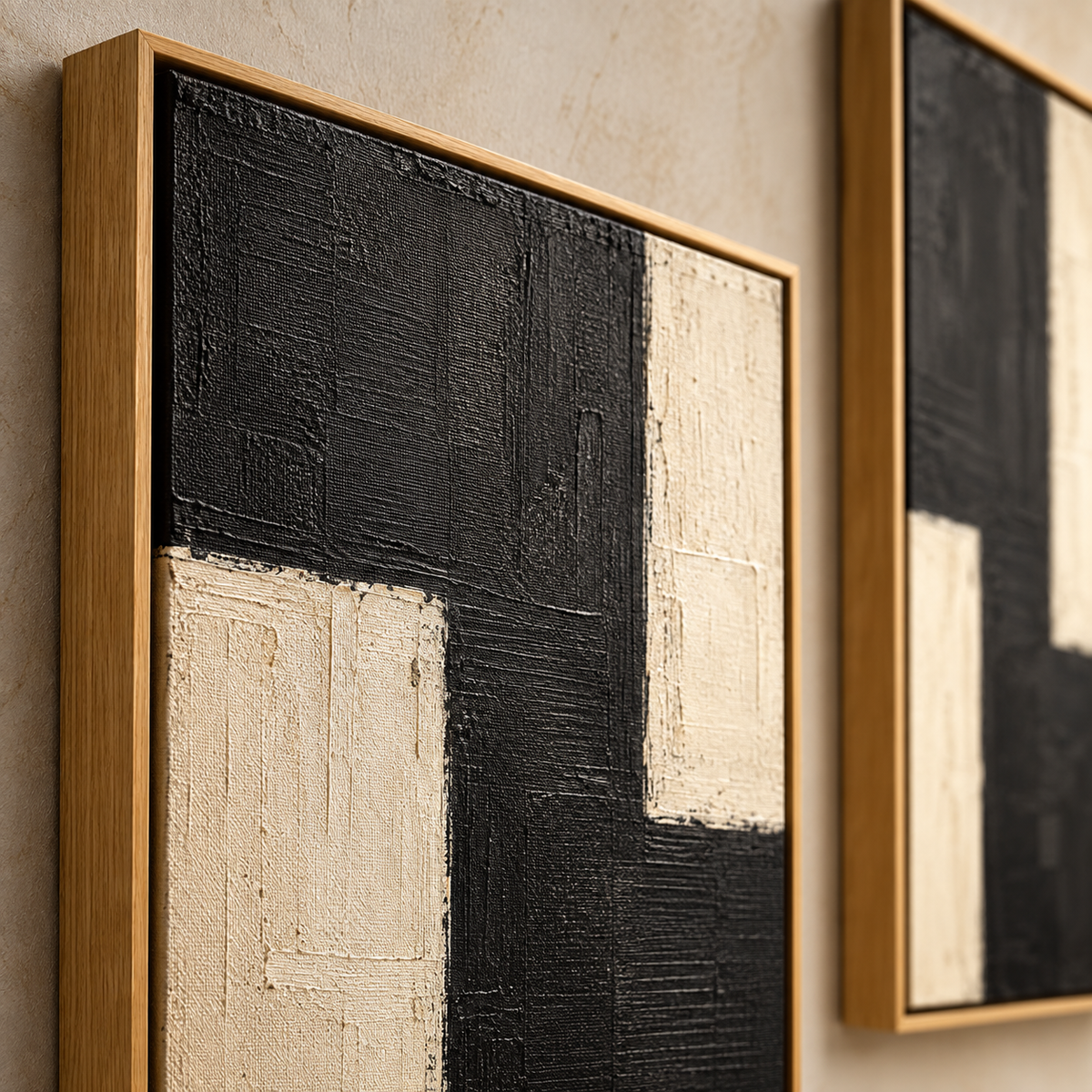 Close-up of textured black and cream painting in a wood floater frame – Twin Monoliths by Rossetti Art