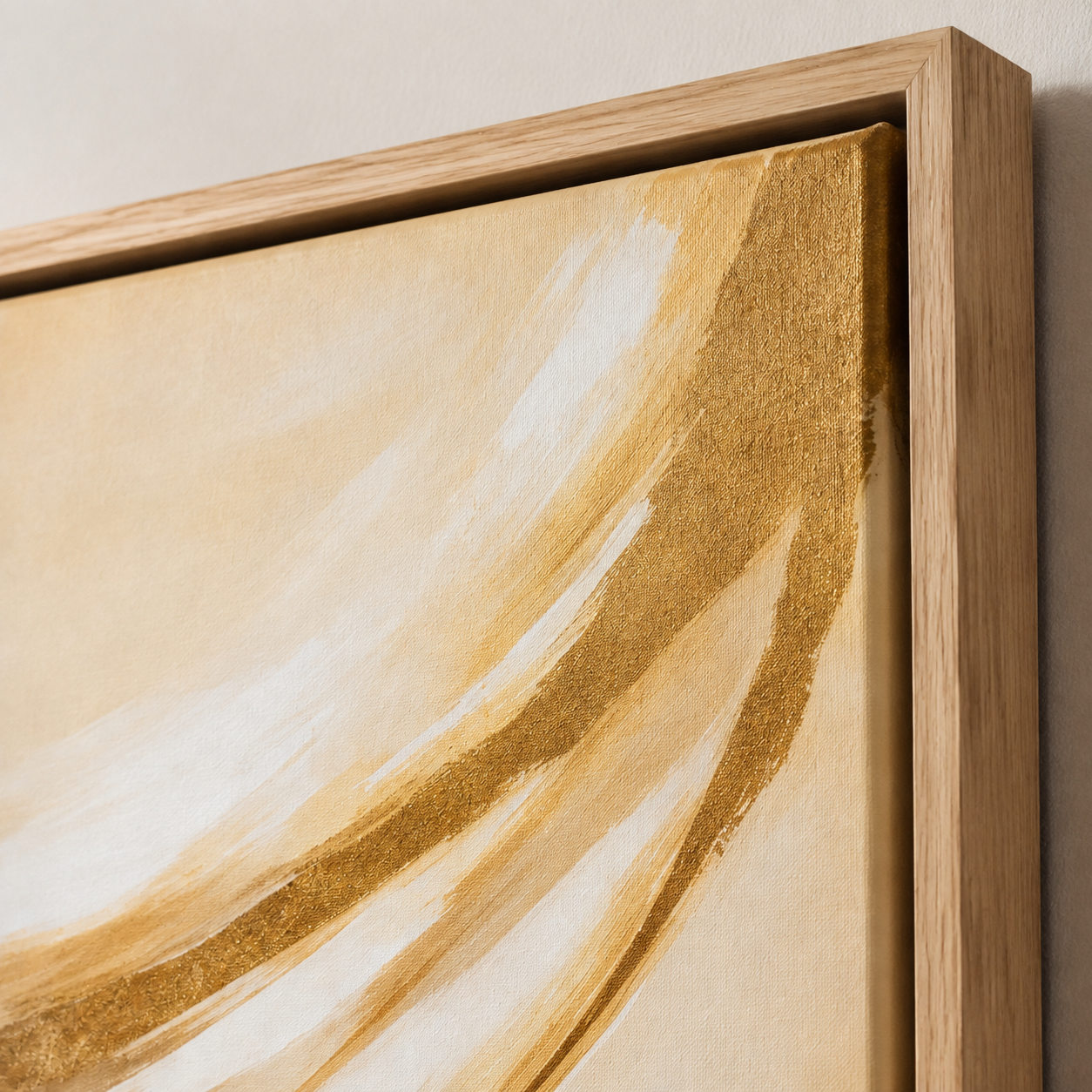 Close-up detail of Golden Drift's textured gold leaf brushstrokes on oak floater frame