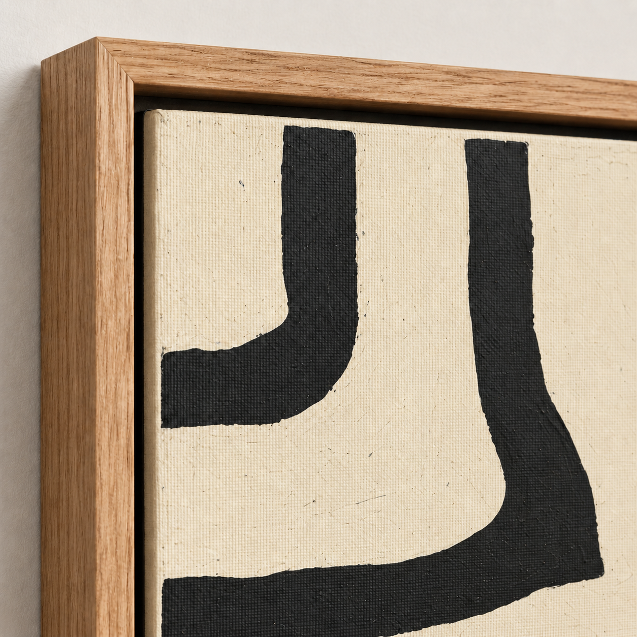 Close-up detail of the oak float frame and canvas texture on Winding Passage line drawing wall art