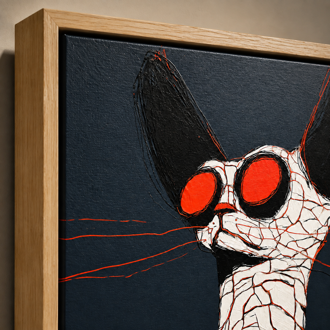Detail of cracked porcelain texture, red crack linework, and oak floater frame corner on Fractured Ember abstract cat wall art