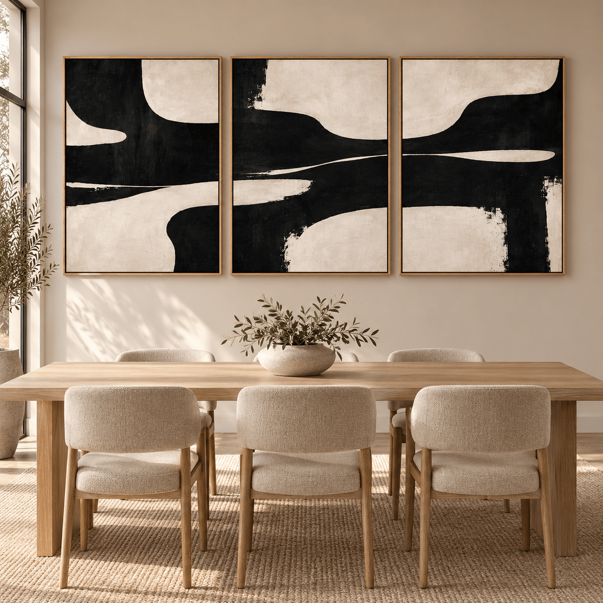 Tidal Drift black and white abstract canvas triptych above a dining table – Rossetti Art