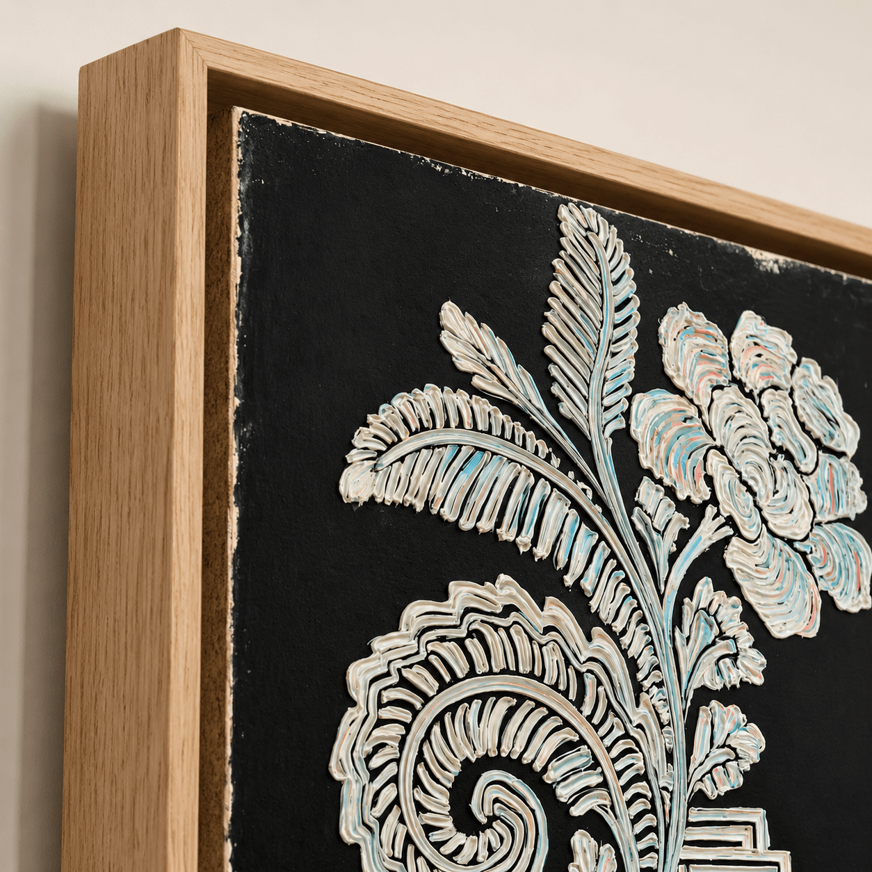 Close-up of black and white botanical wall art canvas showing textured impasto floral detail and hardwood floater frame