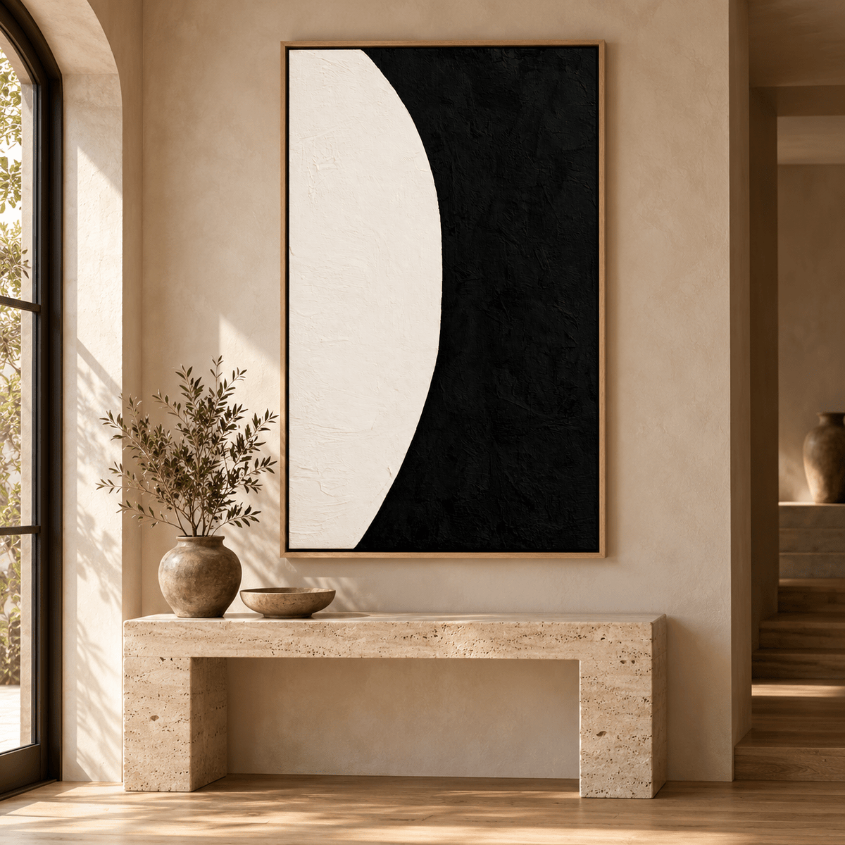 Black and White Vertical Wall Art – Cream Eclipse by Rossetti Art above a stone console in an entryway