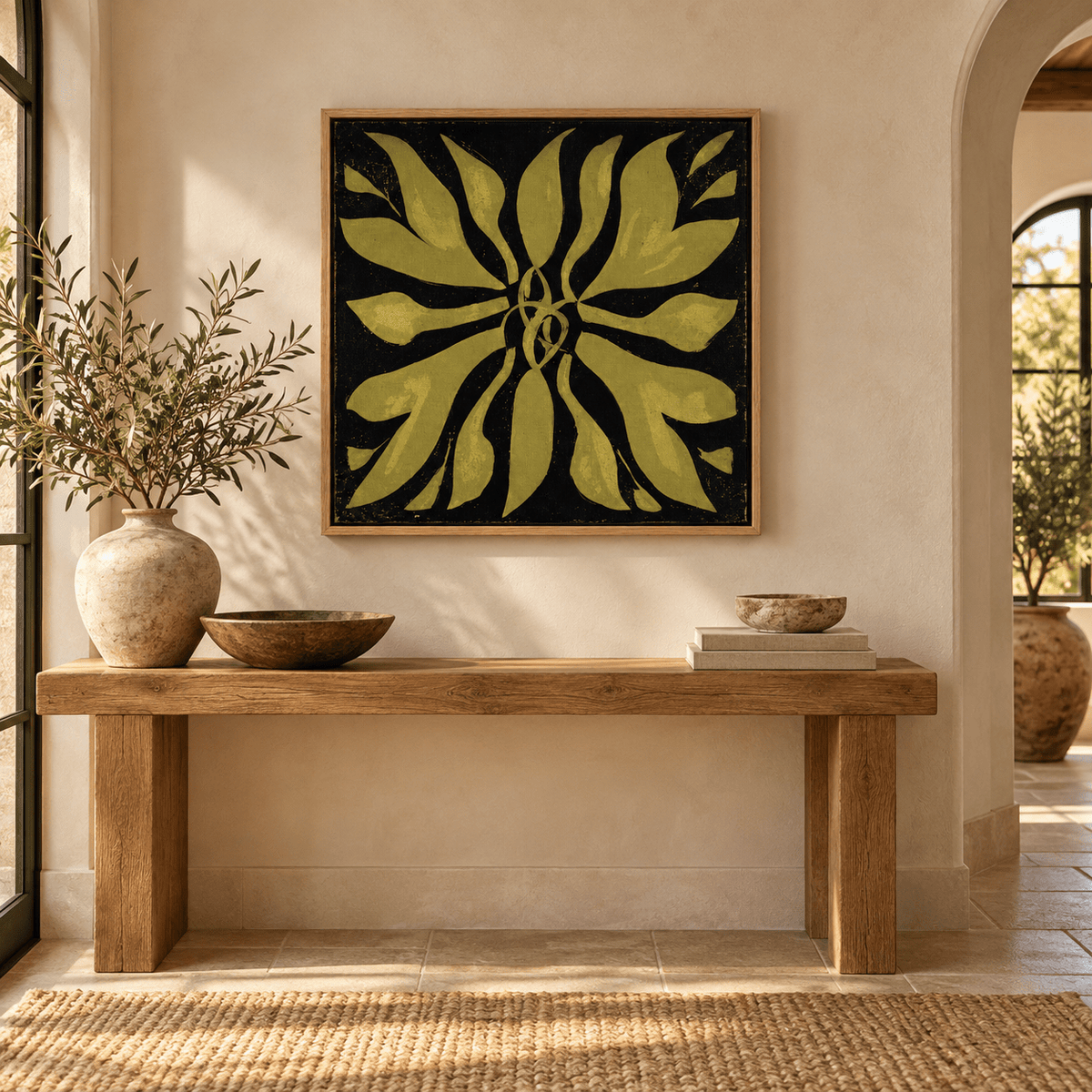 Square gold and black botanical fern canvas print in oak floating frame styled in a warm modern entryway