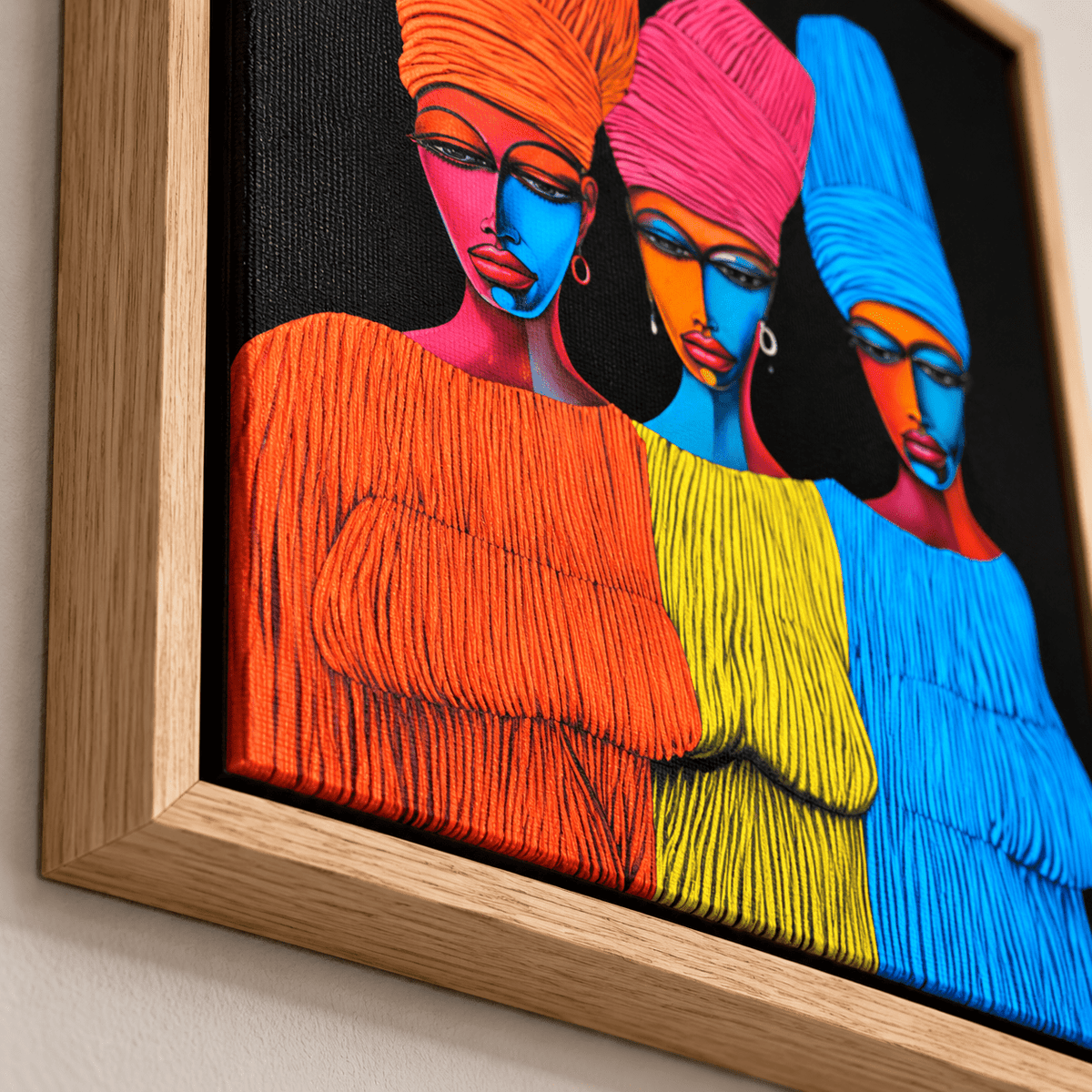 Colorful figurative canvas print styled in a contemporary entryway – Radiant Trio by Rossetti Art