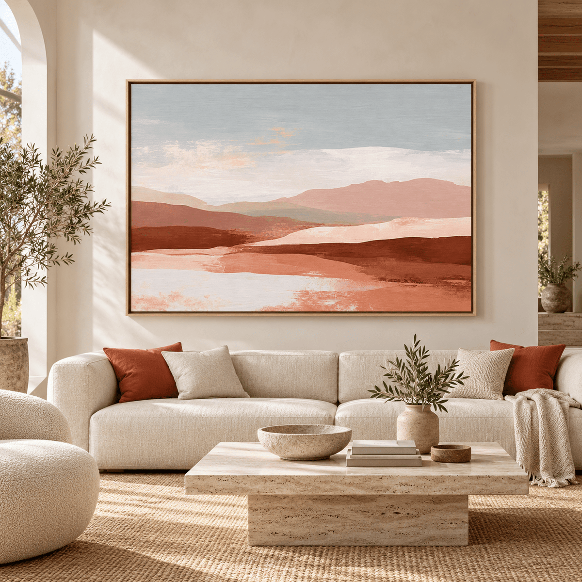 Desert landscape wall art Mesa Dawn above a cream sofa in a bright living room
