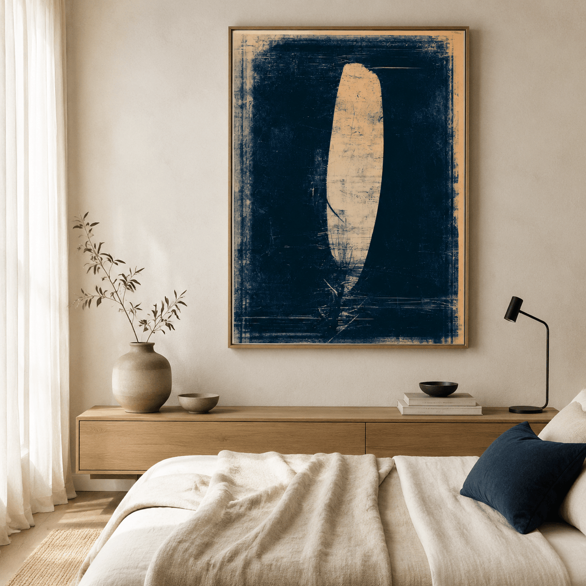 Feather painting hung above the bed in a serene bedroom
