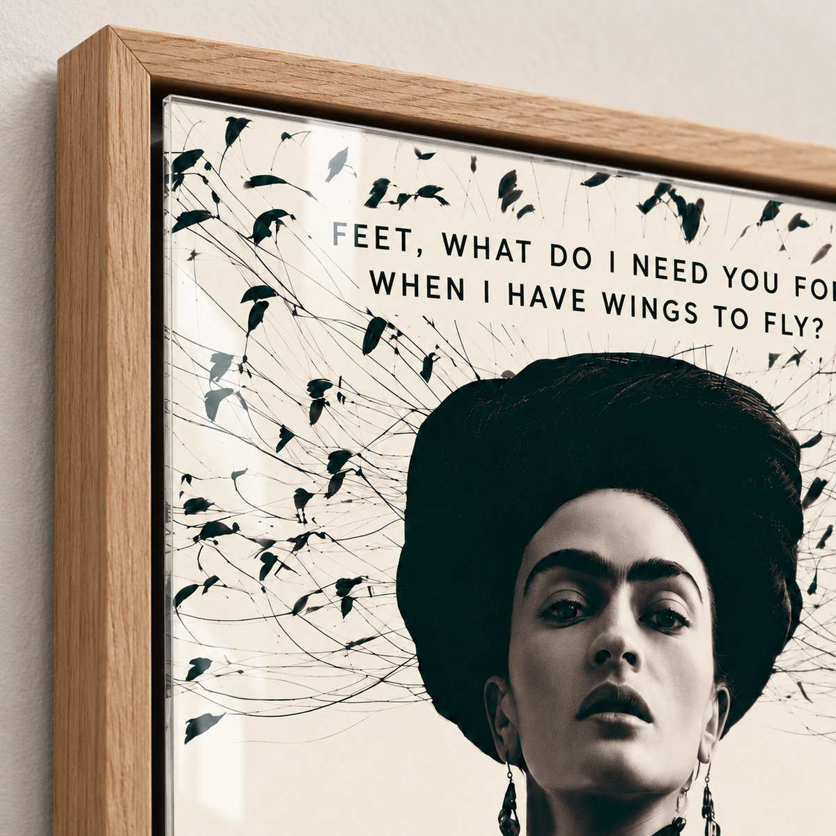 Close-up of the glossy acrylic surface and frame corner of the Frida Kahlo print