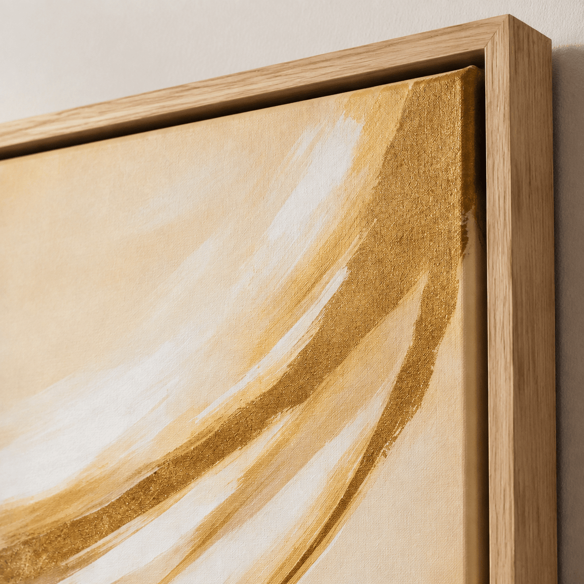 Close-up detail of Golden Drift's textured gold leaf brushstrokes on oak floater frame