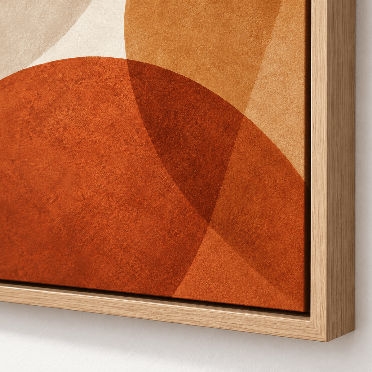 Close-up of the Amber Orbit abstract circles painting showing overlapping terracotta and caramel circles and mottled texture