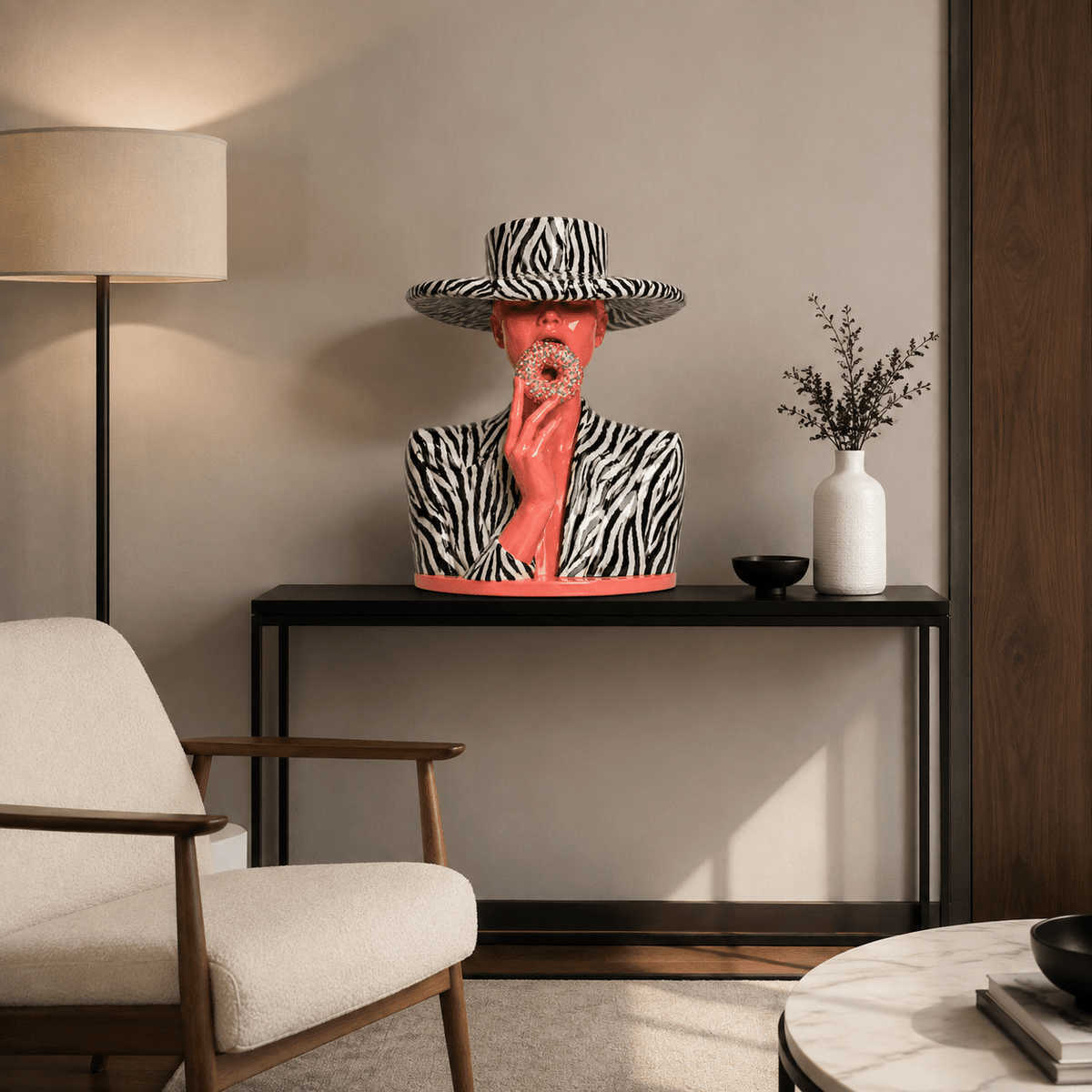 Pop art sculpture styled on a console table beside a floor lamp – Glazed Safari by Rossetti Art