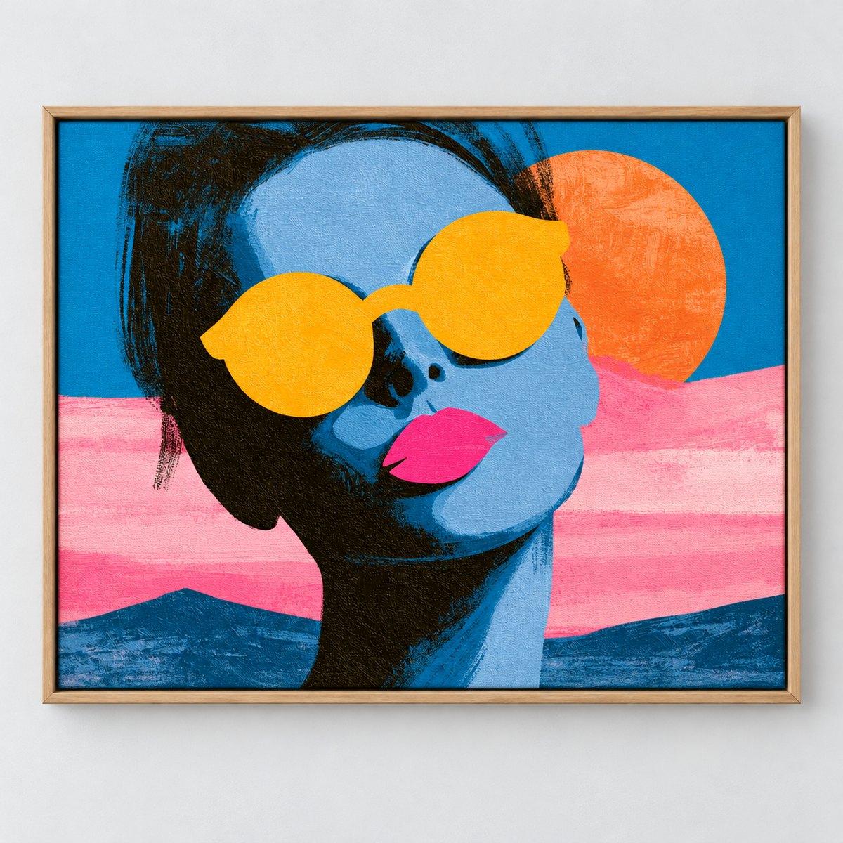 Summer Wall Art – Lemon Lens by Rossetti Art – pop art portrait with a blue face, yellow sunglasses, pink lips and an orange sun, framed front view