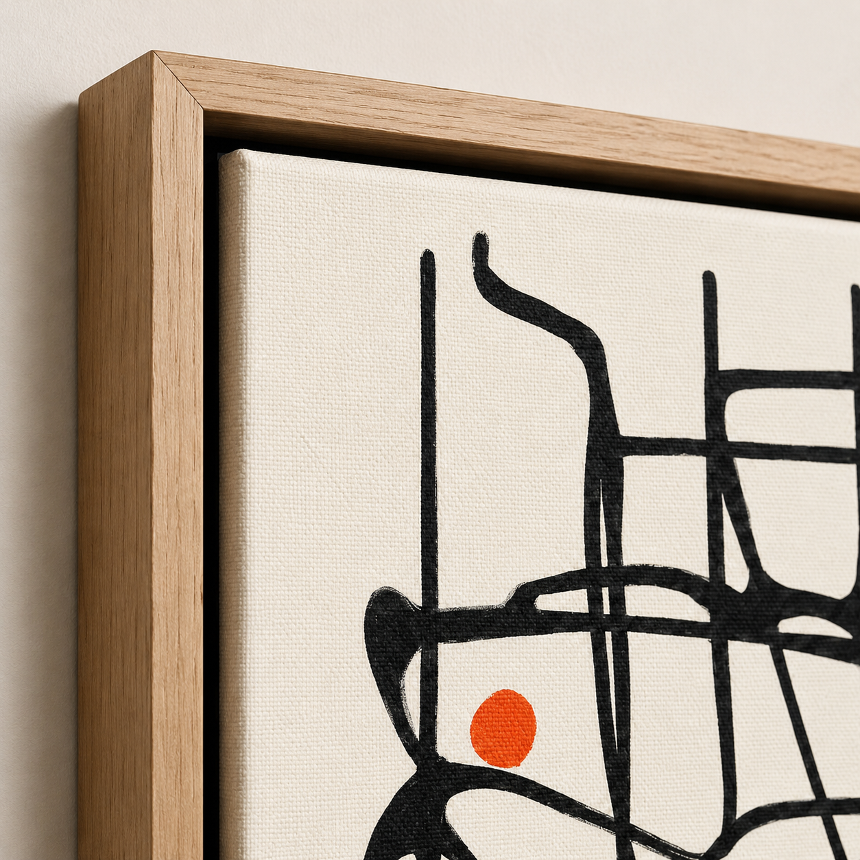 Close-up detail of the oak float frame and canvas texture on Tangled Orbit doodle wall art