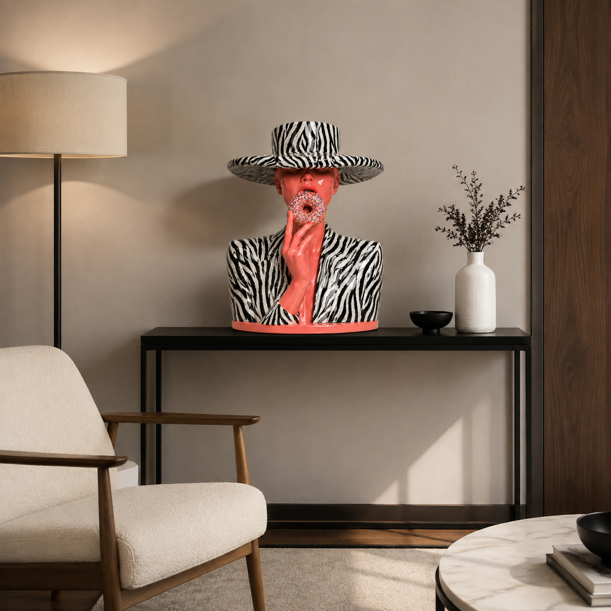 Pop art sculpture styled on a console table beside a floor lamp – Glazed Safari by Rossetti Art