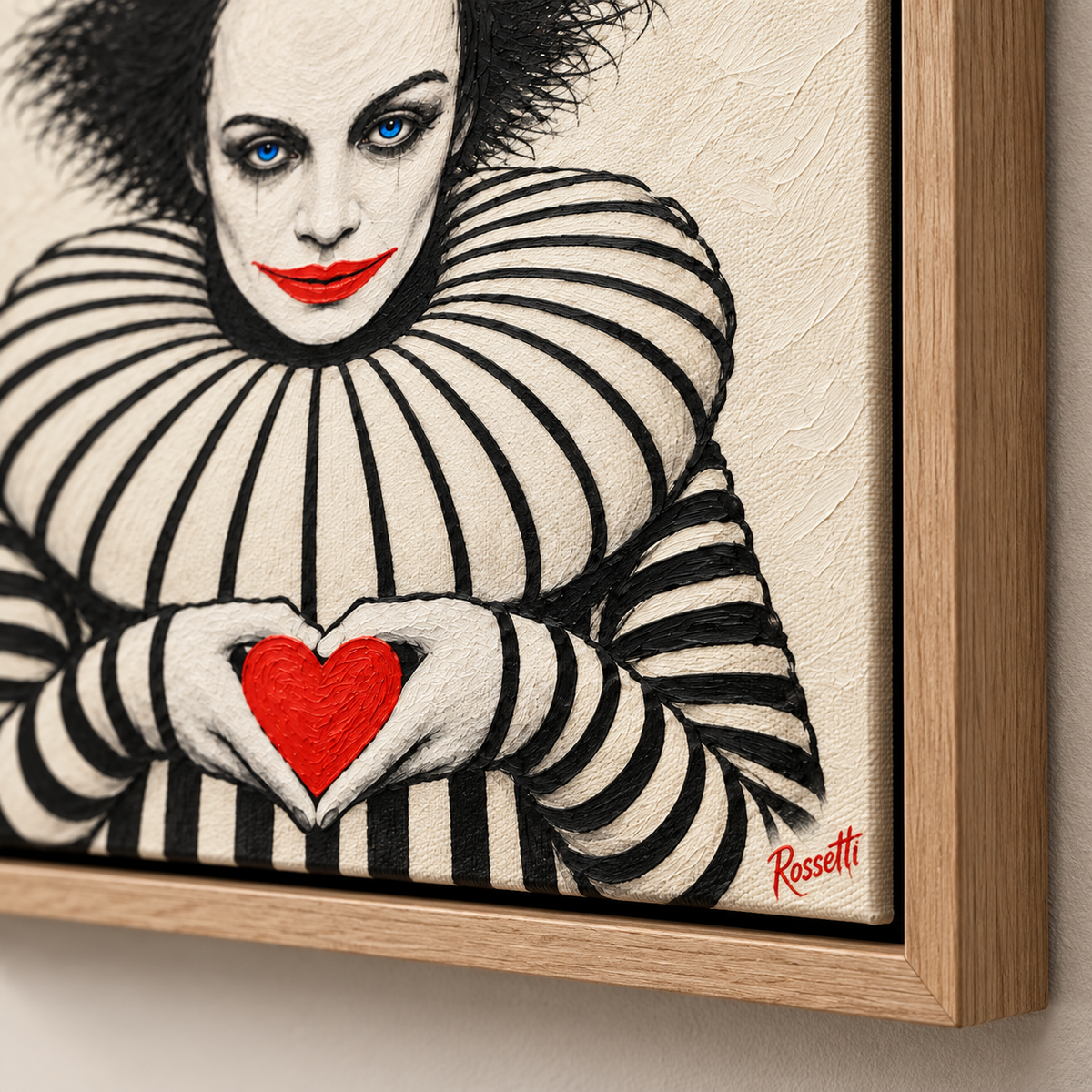 Black white and red clown wall art in an oak floater frame