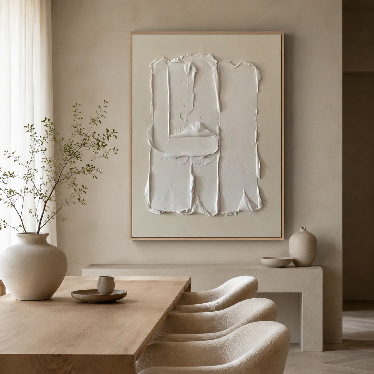 Plaster wall art hanging above a console table in a warm neutral dining room – Hushed Fold by Rossetti Art