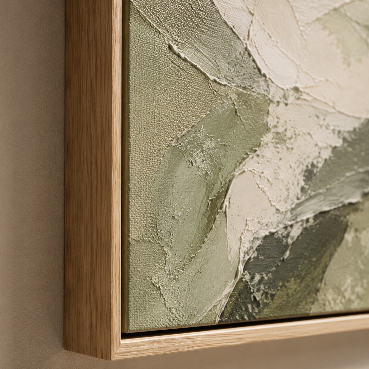 Close-up detail of palette-knife texture on Quiet Canopy sage green abstract art canvas, oak floater frame