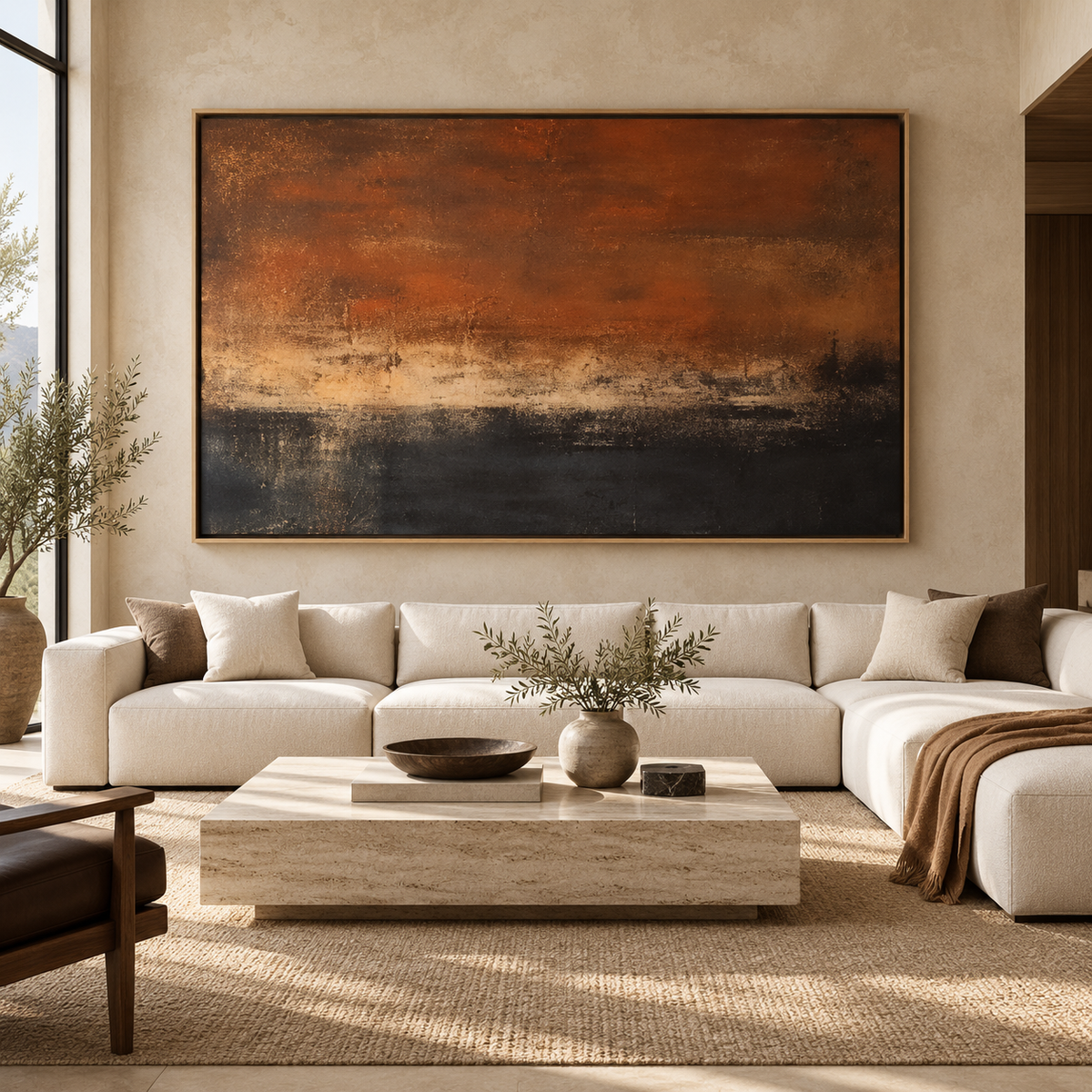 Desert sunset painting above a cream sectional sofa in a living room – Scorched Horizon by Rossetti Art
