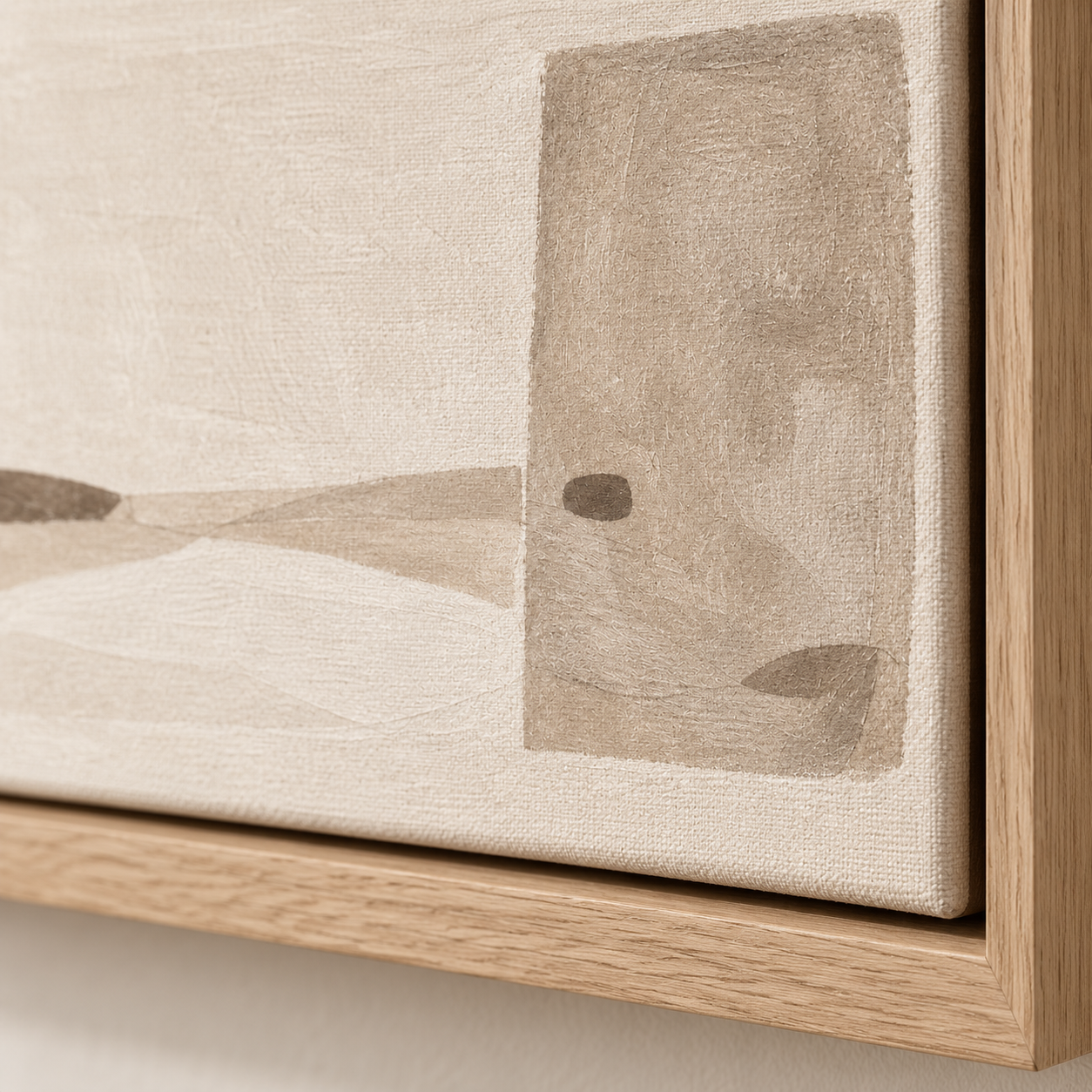 Close-up detail of the taupe abstract canvas texture and oak floater frame — Quiet Threshold by Rossetti Art