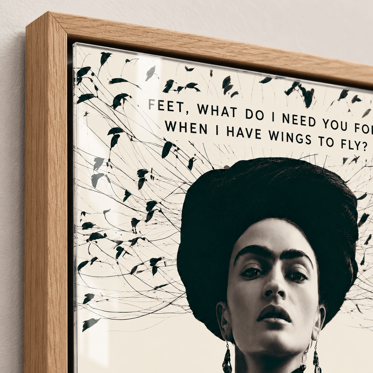 Close-up of the glossy acrylic surface and frame corner of the Frida Kahlo print