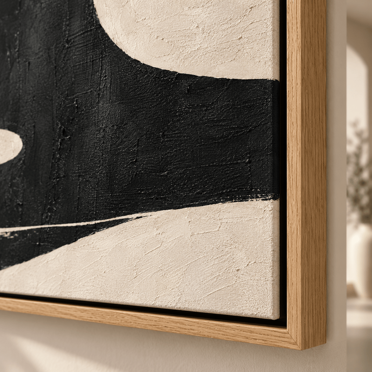 Close-up detail of the black and ivory abstract curves on Tidal Drift by Rossetti Art