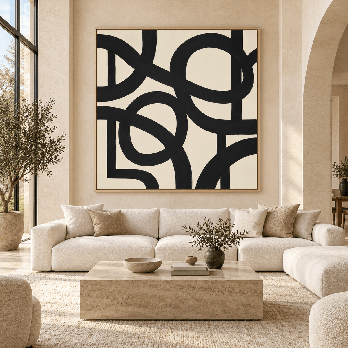 Oversized black line abstract painting in a large neutral living room
