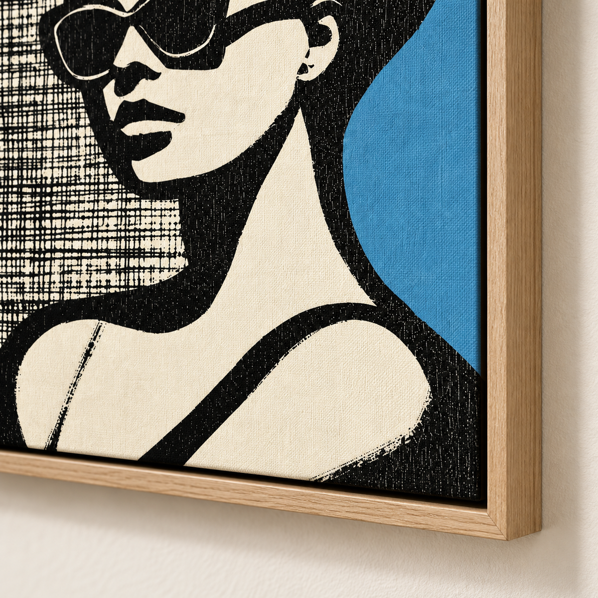 Blue and Black Wall Art – Cat-Eye Noir by Rossetti Art – close-up of the bold black shapes, cream face and blue accent at the framed corner