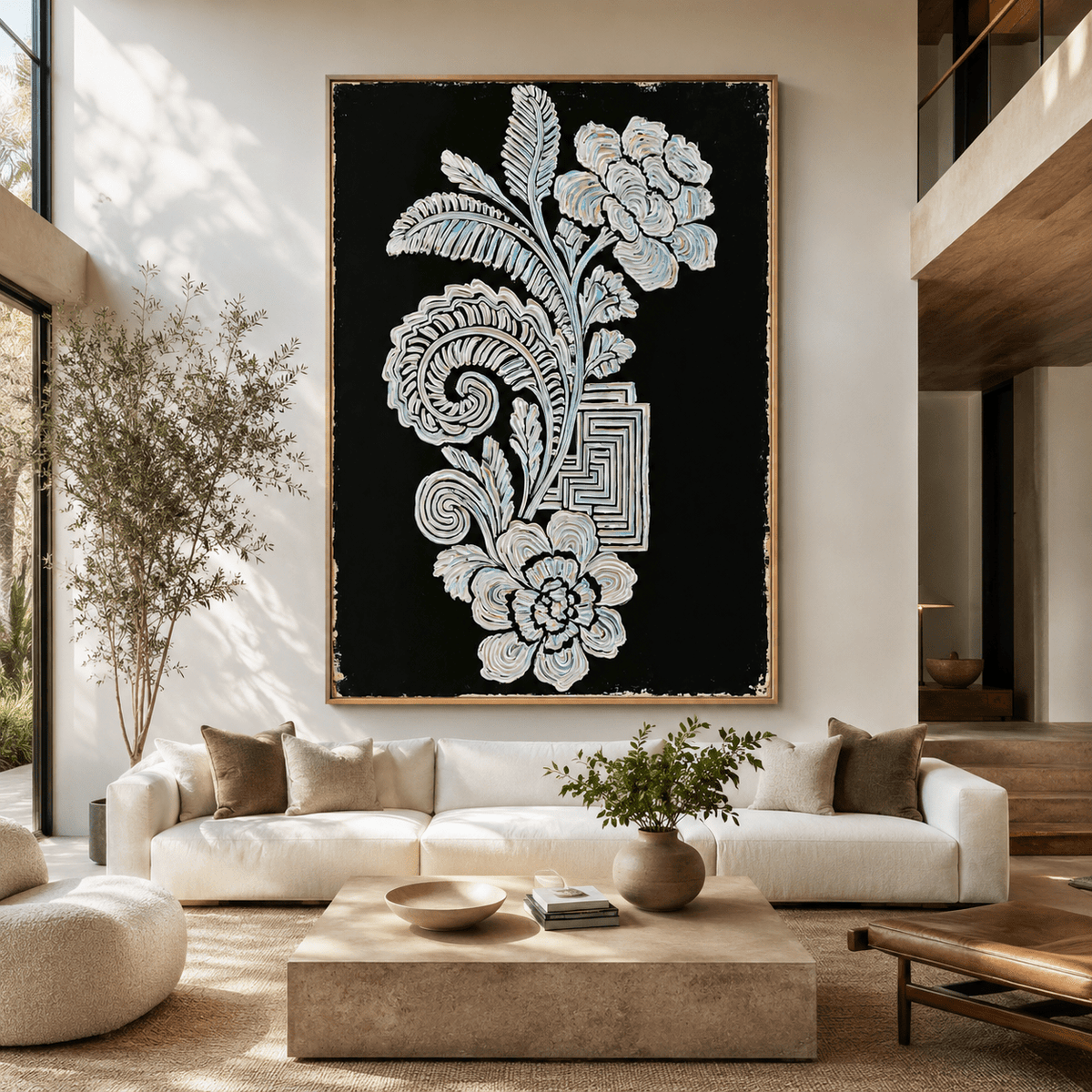 Black and white botanical wall art canvas print displayed above a sofa in a living room