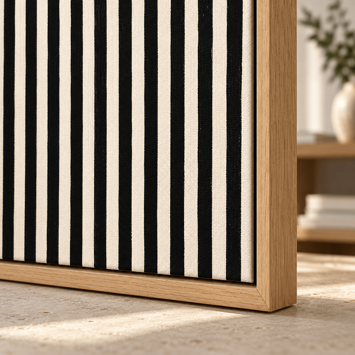 Close-up corner of the Ivory Stripe canvas print in a hardwood floater frame