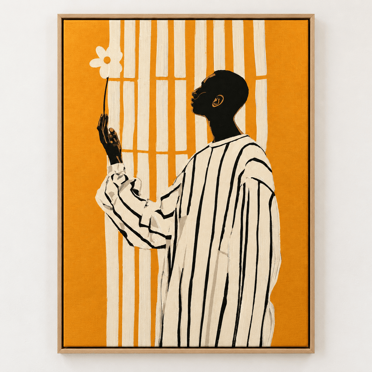 Black Art Wall Art – Sunlit Offering by Rossetti Art, vertical canvas print of a figure in profile holding a white daisy on orange with cream stripes