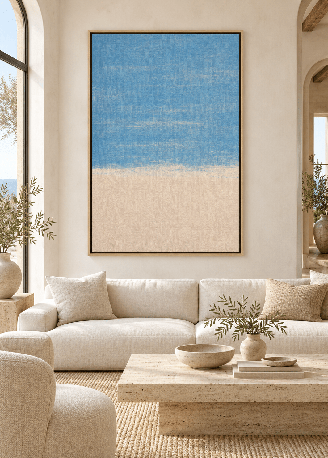 Light blue wall art Pale Shore above a cream sofa in a living room – Rossetti Art