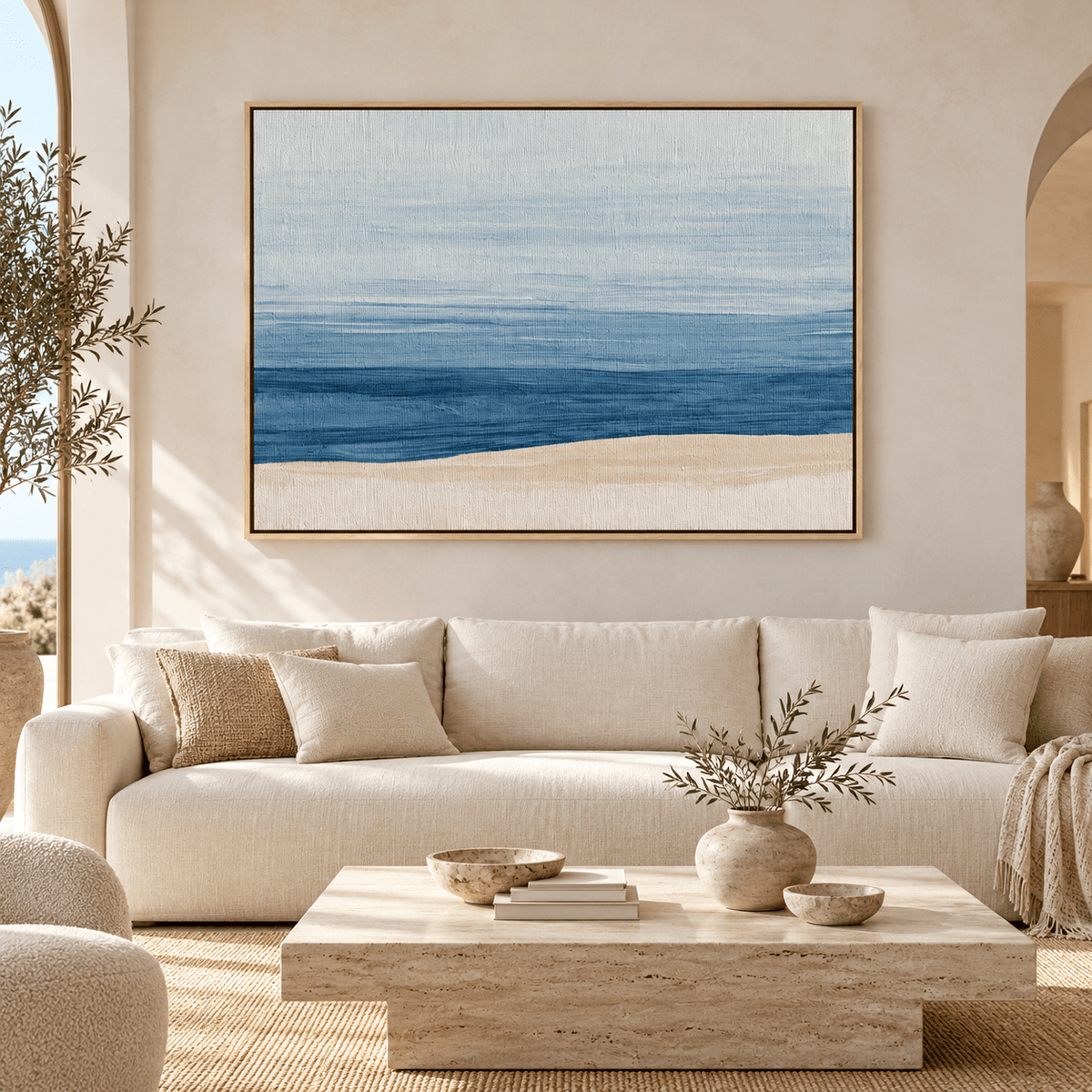Ocean abstract painting canvas print Shoreline Hush above a cream sofa in a living room – Rossetti Art