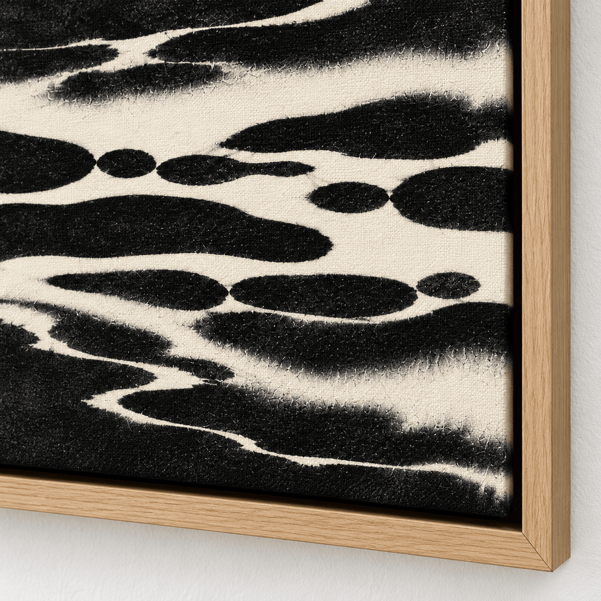 Panoramic Wall Art Canvas Print – Ink Current close-up of the black and cream ink pools and canvas corner by Rossetti Art