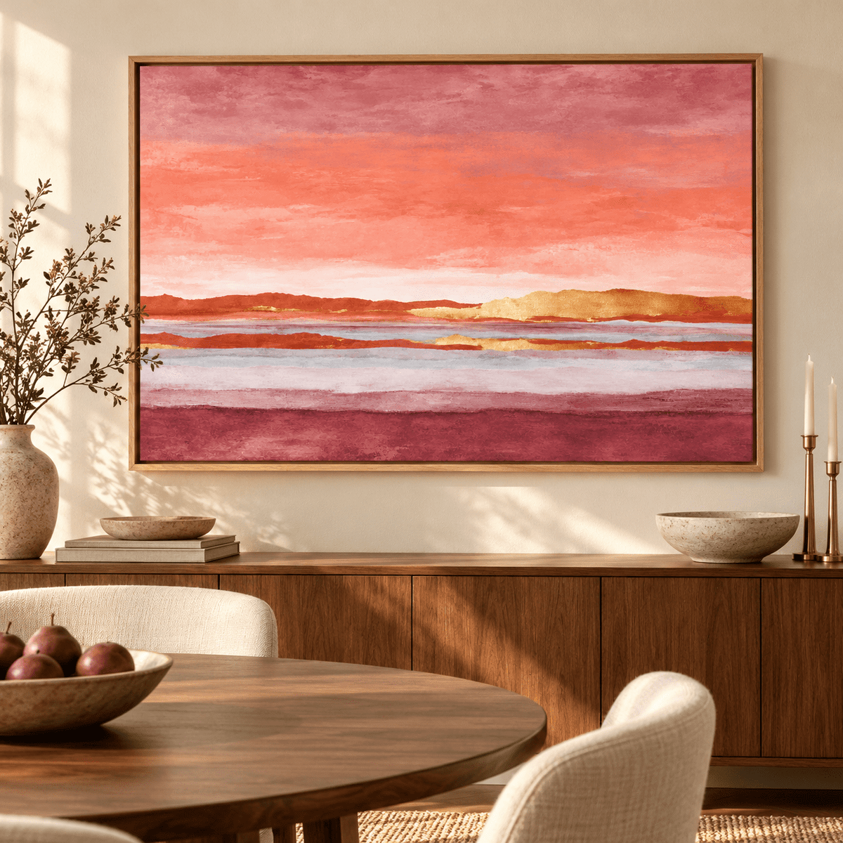 Pink and Gold Wall Art – Gilded Dusk by Rossetti Art – framed abstract sunset landscape above a walnut sideboard in a warm dining room