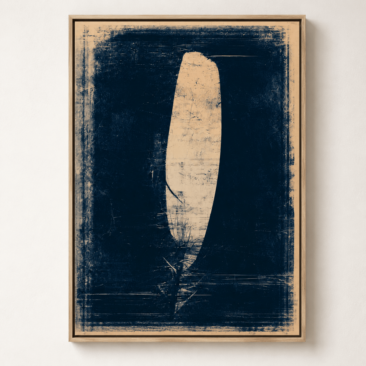 Feather painting, Still Flight, shown at an angle in an oak floater frame