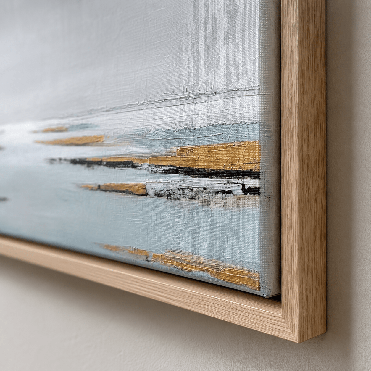 Close-up detail of gray and tan wall art canvas texture and oak floater frame corner – Low Water by Rossetti Art