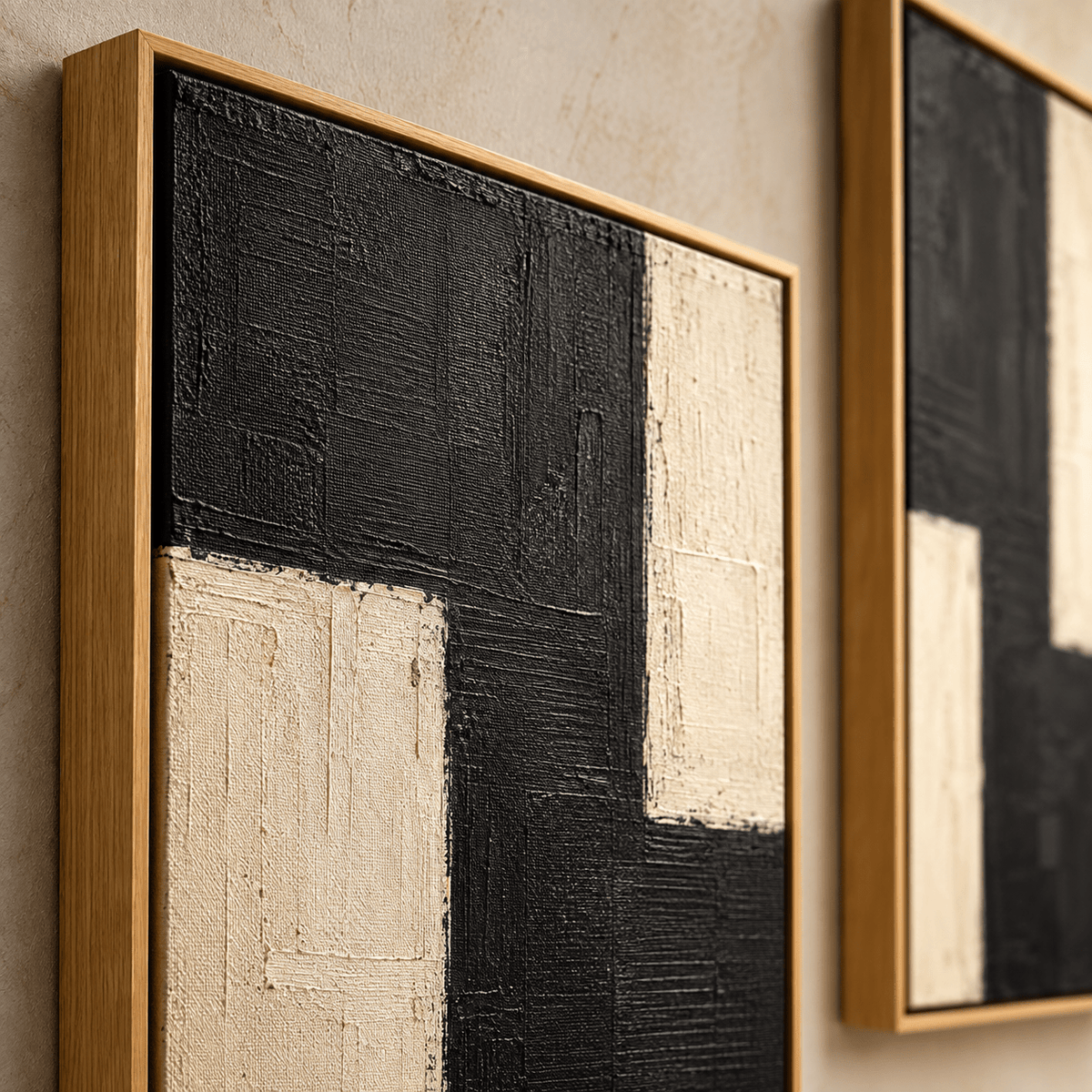 Close-up of textured black and cream painting in a wood floater frame – Twin Monoliths by Rossetti Art