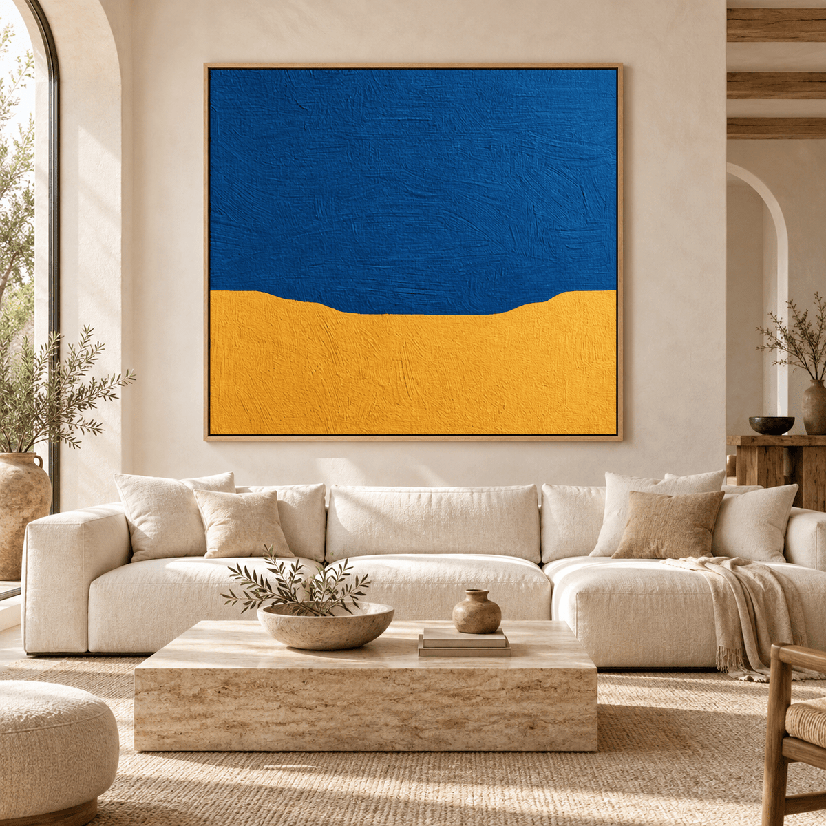 Blue and yellow abstract painting Marigold Shore above a cream sofa in a living room – Rossetti Art
