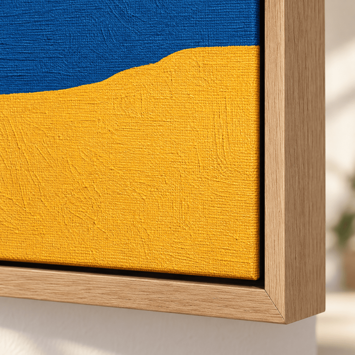 Corner detail of the Marigold Shore blue and yellow abstract painting showing the textured paint – Rossetti Art