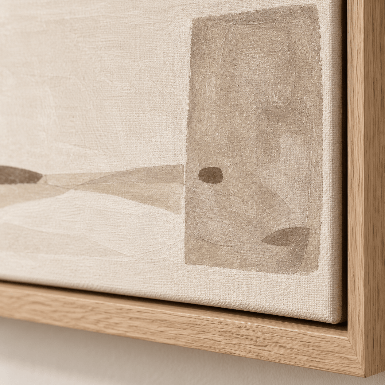 Close-up detail of the taupe abstract canvas texture and oak floater frame — Quiet Threshold by Rossetti Art