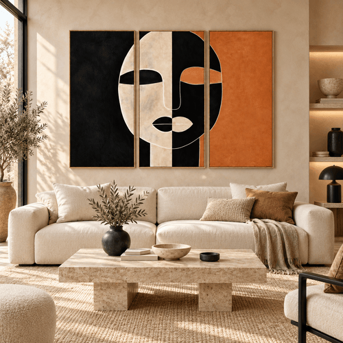 Triptych wall art canvas set hanging above a sectional sofa in a living room – Ochre Divide by Rossetti Art